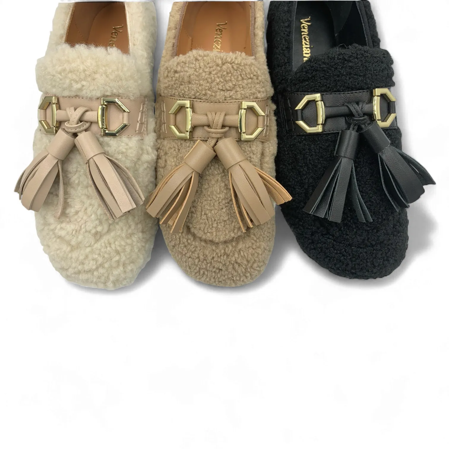 Mocasín Bolzano Venezianas en borreguito beige, camel y negro con borlas decorativas